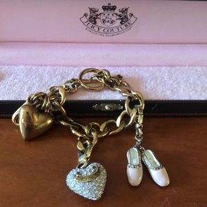 Juicy couture bracelet includes 2 charms